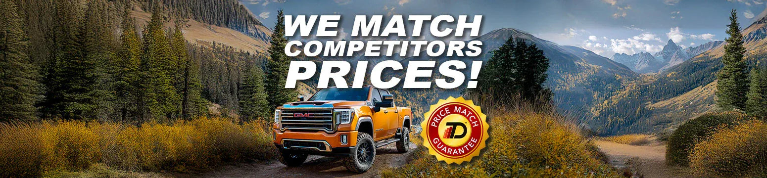 Truck driving on a scenic mountain road with promotional text overlay for price matching.