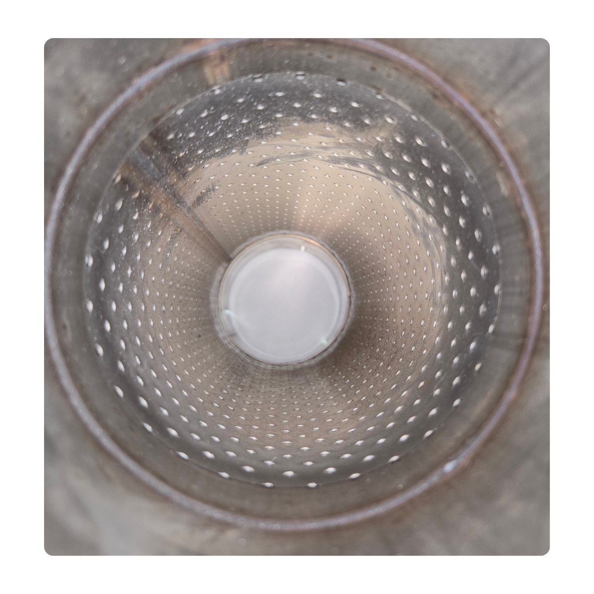 Perforated straight-through core inside stainless steel diesel muffler